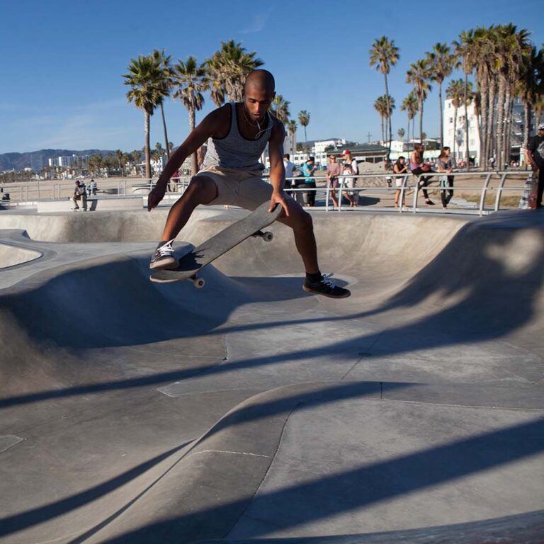 man skateboarding in venice beach california